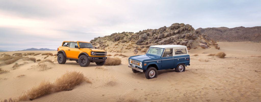 2021 Ford Bronco next to a classic Bronco. 